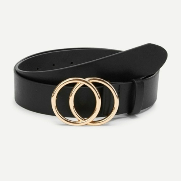 black belt with gold circle buckle